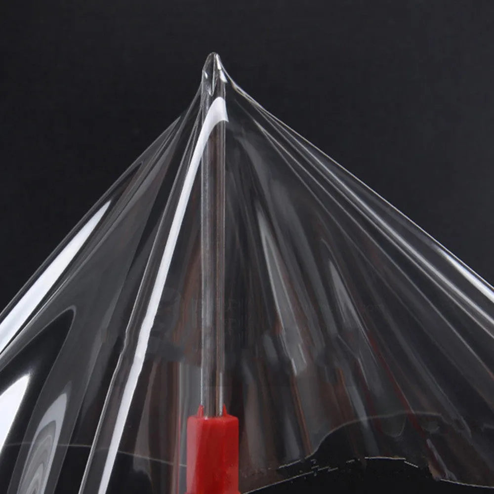 Transparent TPH car paint protection film roll showing clear coating for full vehicle exterior wrap