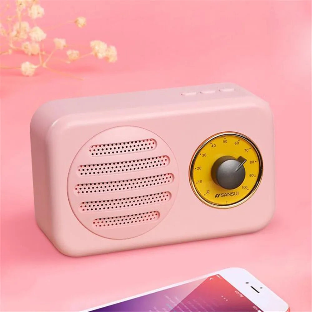 Portable Bluetooth speaker in wood grain finish with FM radio and micro USB cable