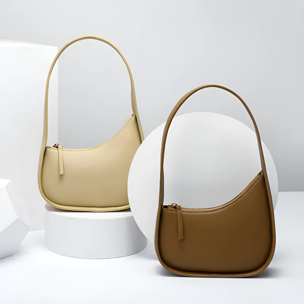 Genuine leather women's half-moon shoulder bag with wide strap in light brown colour