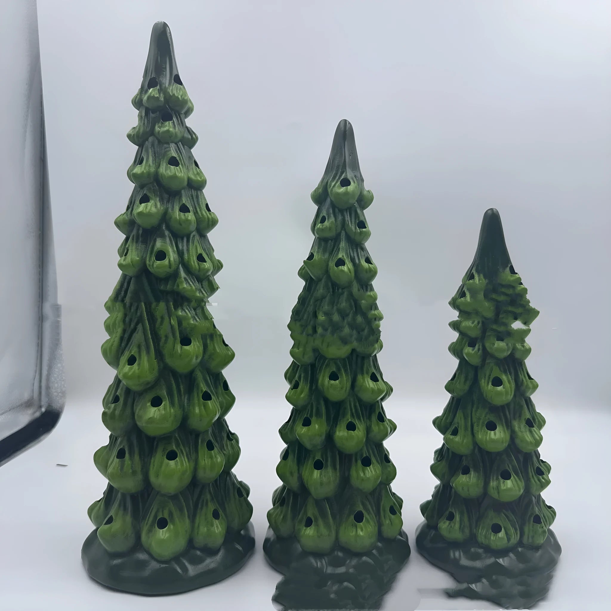 European style resin Christmas tree ornament with LED lights in coloured or warm white, shown in 20cm, 25cm, and 30cm sizes.