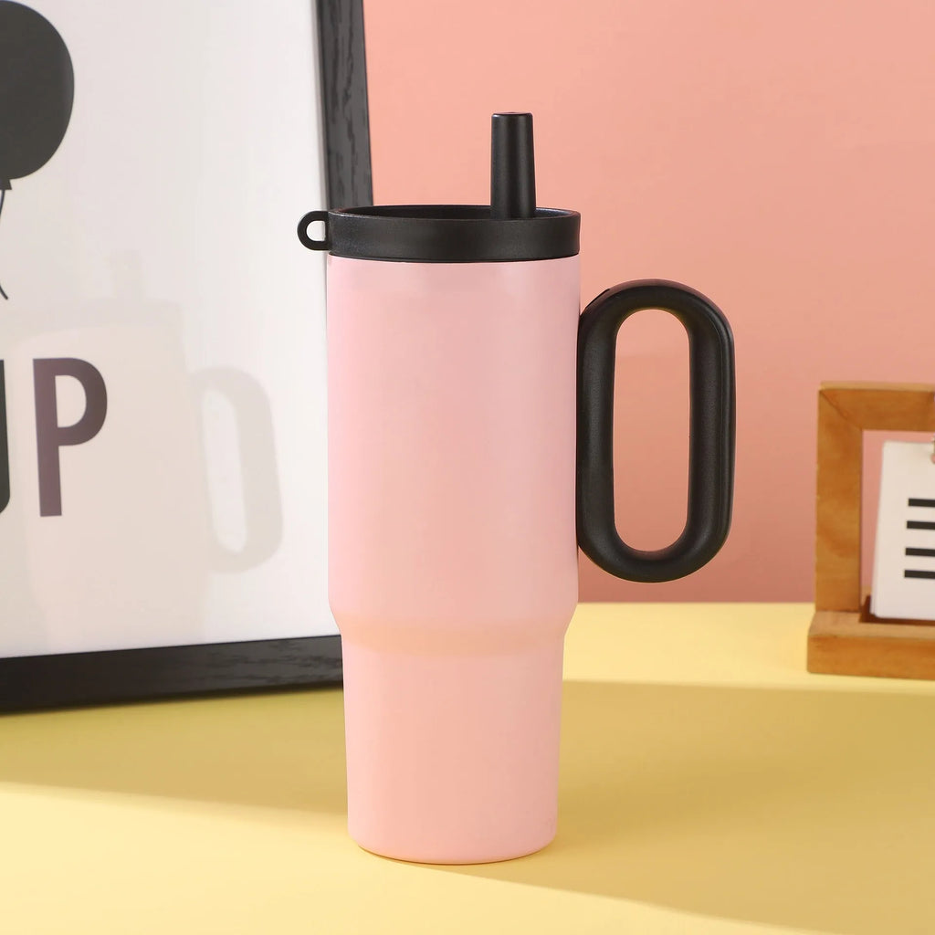Insulated plastic straw cup with carry handle in five colour options showing 700ml capacity