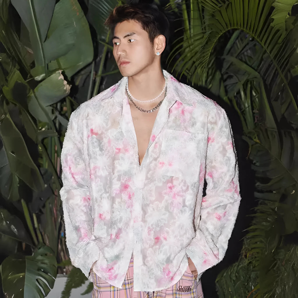 Pink floral long sleeve shirt with a three-dimensional embossed pattern and a loose fit.