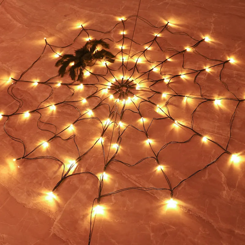 Halloween LED spider web string light with 70 warm white lights and furry spider on black wire, 1 metre diameter