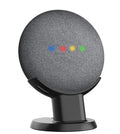 Black PlusAcc plastic stand holding a Google Home Mini speaker on a table.