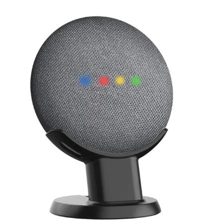 Black PlusAcc plastic stand holding a Google Home Mini speaker on a table.