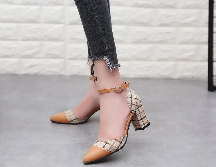 Thick heel high heels with buckle fastening, black colour, 7.5cm heel, side view