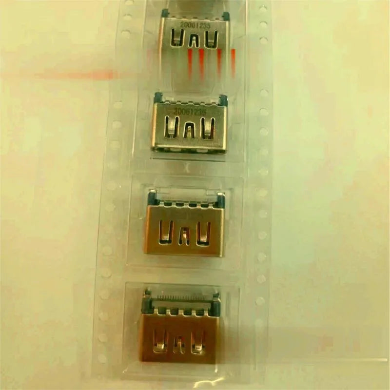Silver HDMI host interface socket for game console repair and signal connectivity.
