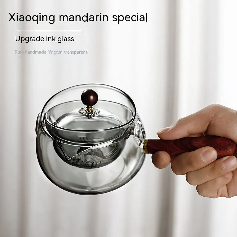 Semi-automatic rotary glass teapot with wooden handle and infuser in transparent borosilicate glass
