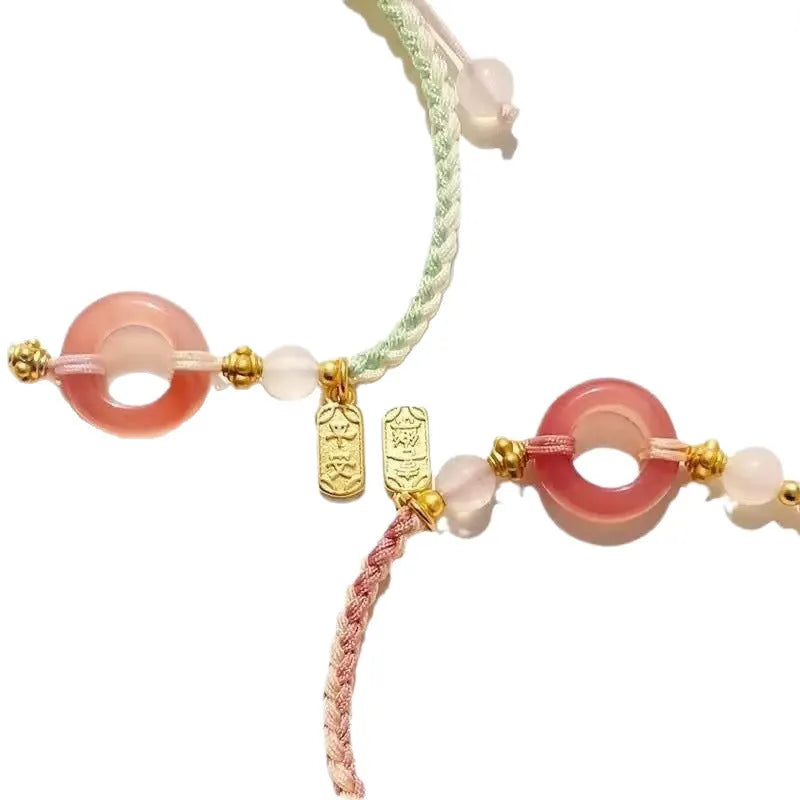 National style peach blossom patterned woven bracelet with peace buckle closure in three colour options