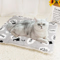 Lambskin pet blanket in flannel cashmere with cute cartoon pattern, grey colour, 55x70cm size on a pet bed