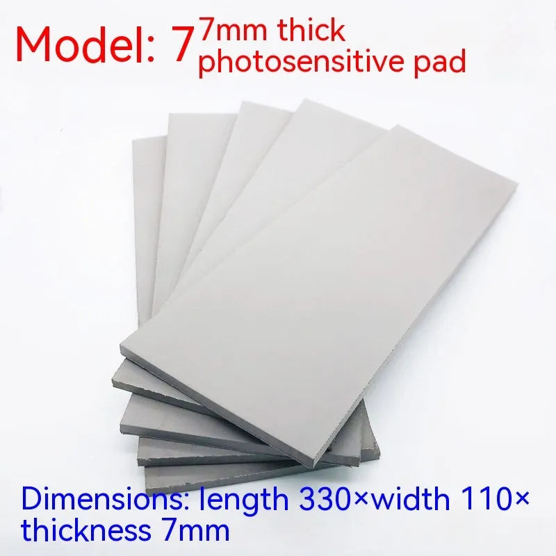 Black and grey plastic photosensitive mat for stamp creation measuring 330mm by 110mm