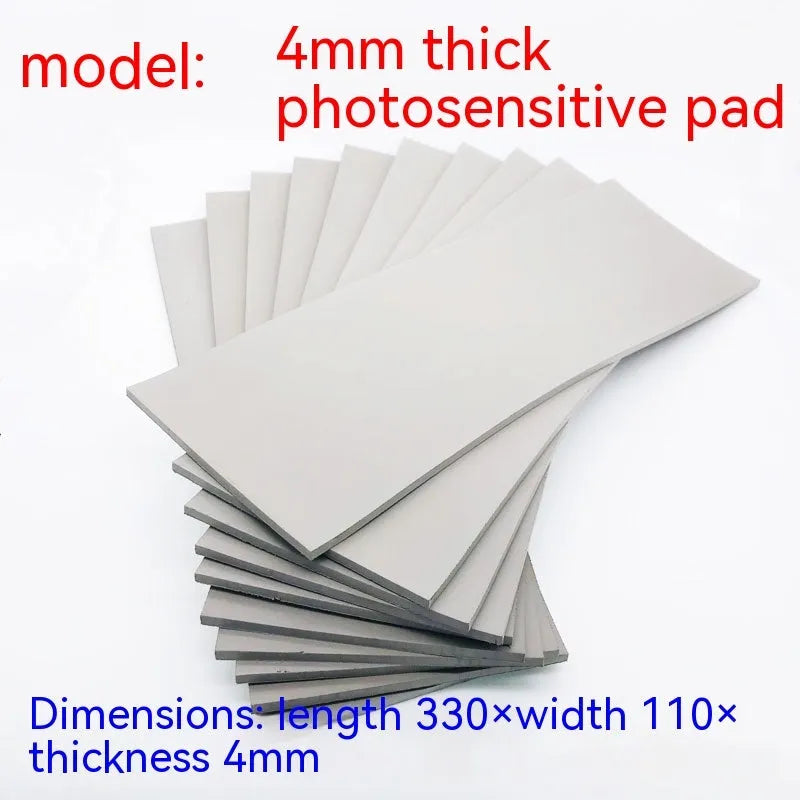 Black and grey plastic photosensitive mat for stamp creation measuring 330mm by 110mm