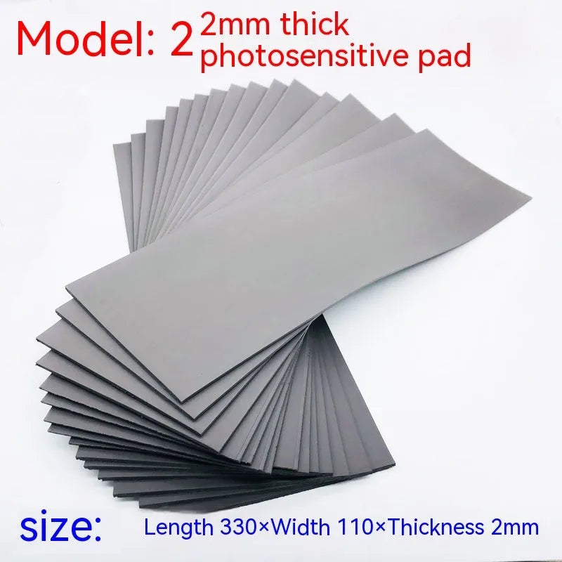 Black and grey plastic photosensitive mat for stamp creation measuring 330mm by 110mm