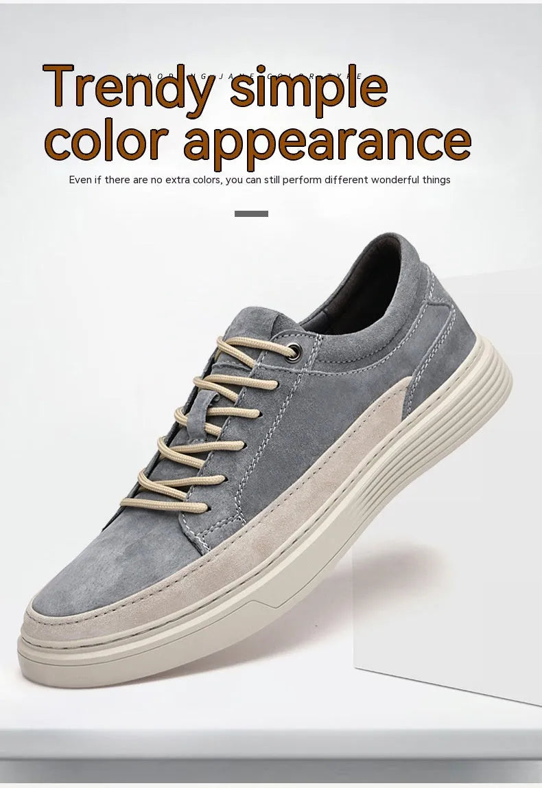 Men's grey casual leather skate shoes with a round toe and front lace-up on a soft rubber sole.