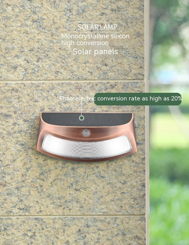 Solar garden wall lamp with retro smiling face design for outdoor decorative lighting