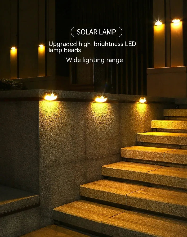 Solar garden wall lamp with retro smiling face design for outdoor decorative lighting