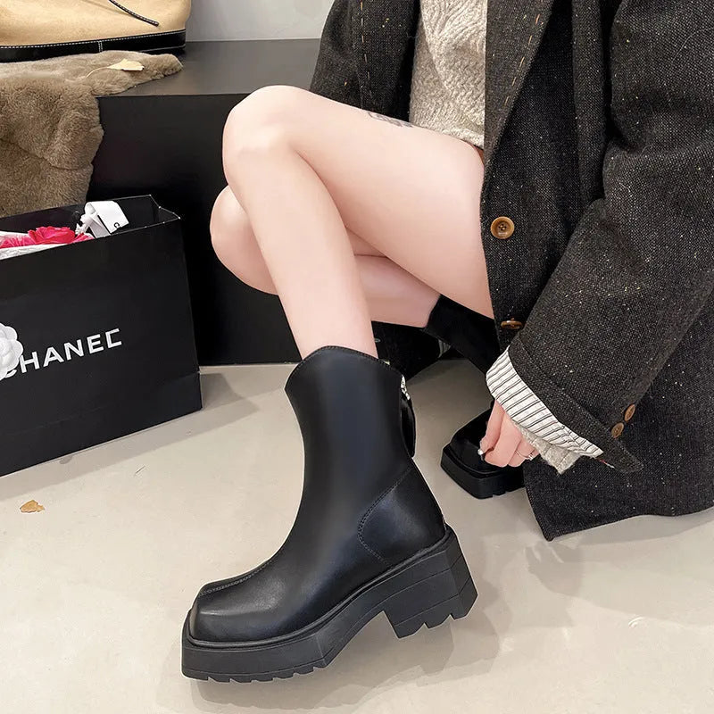 Black women's platform Martin ankle boots with square toe, back zipper, and a 6-8cm heel.