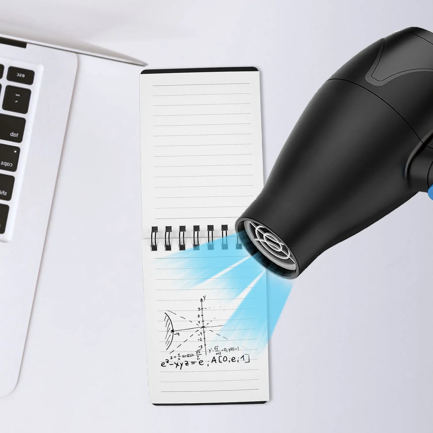 A6 spiral notebook with PP cover, pen, and rag on a surface