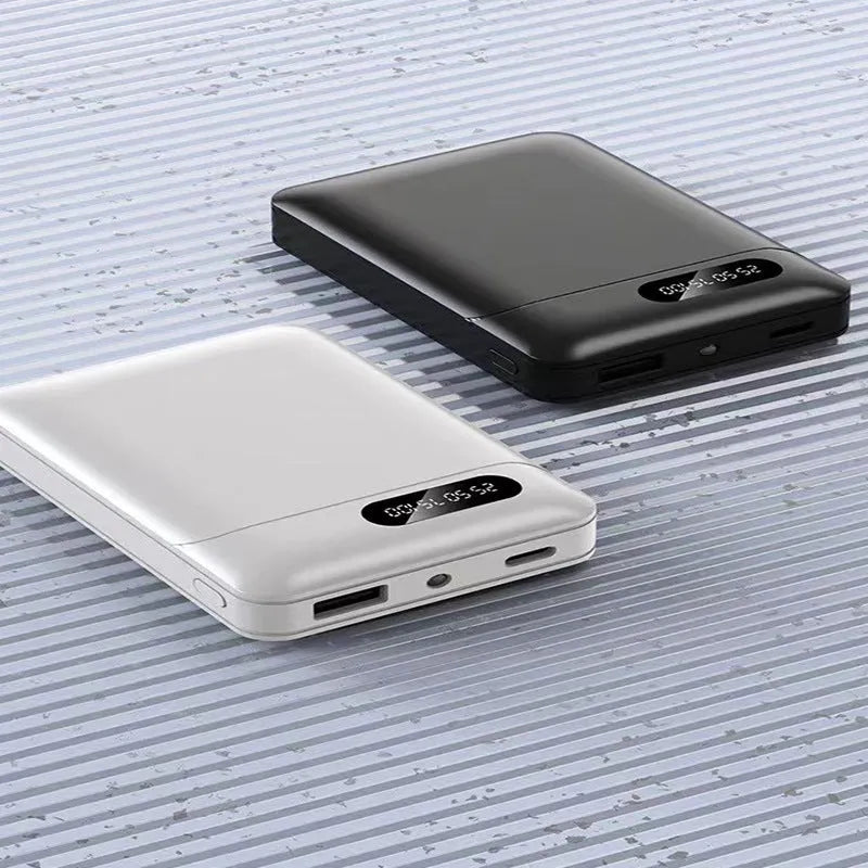 Black and white 10000mAh portable power bank with USB ports