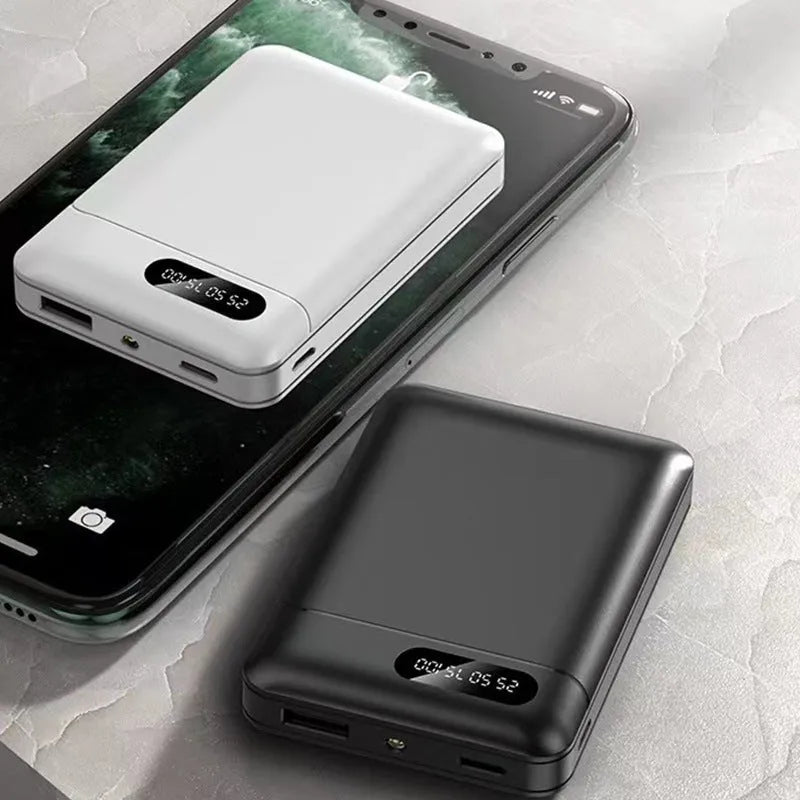 Black and white 10000mAh portable power bank with USB ports