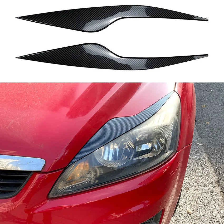 Two ABS plastic headlight eyebrow stickers for Ford Focus in carbon fibre and piano black finishes.