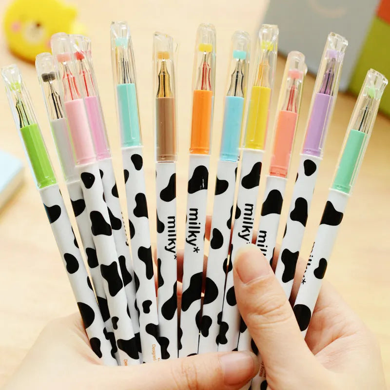 Box of 12 cow print gel pens with assorted colours and 0.38mm fine tips.