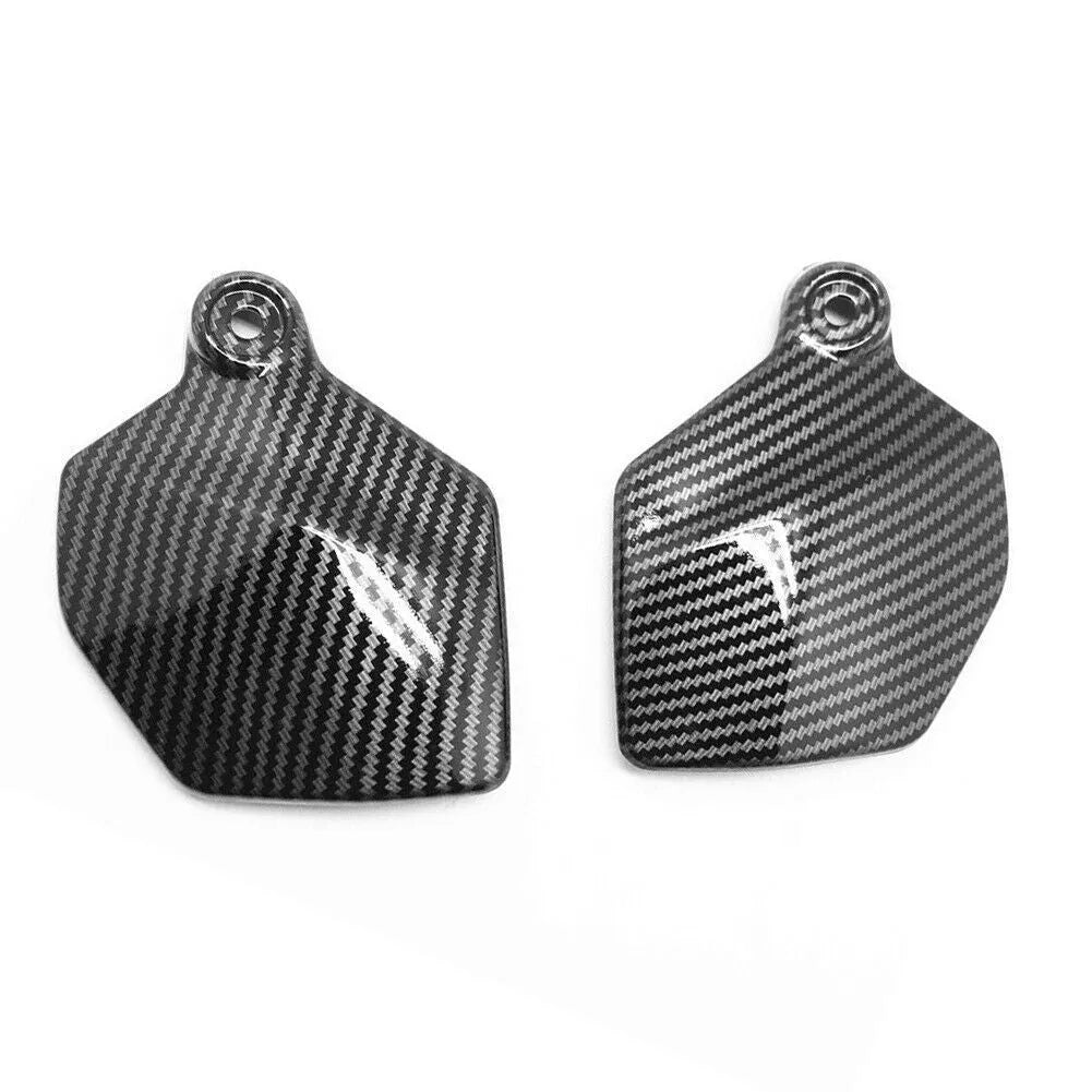 Pair of black carbon fibre patterned motorcycle fairing frame covers for Honda CBR1000RR.
