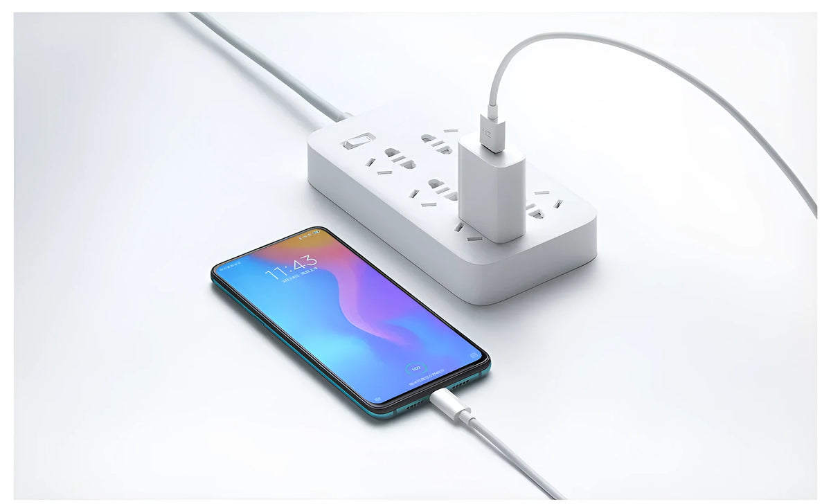 White Mi USB Fast Charger model MDY-08-EH with three-step output on plain background