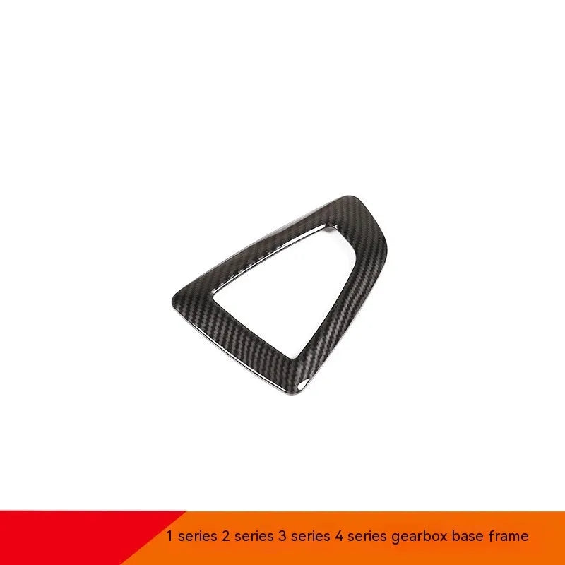 BMW gear selector base frame in ABS with carbon fibre pattern and titanium accent