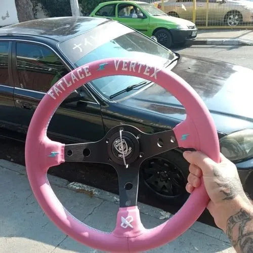 Pink leather steering wheel cover with embroidery, showing integrated aluminium alloy bracket.