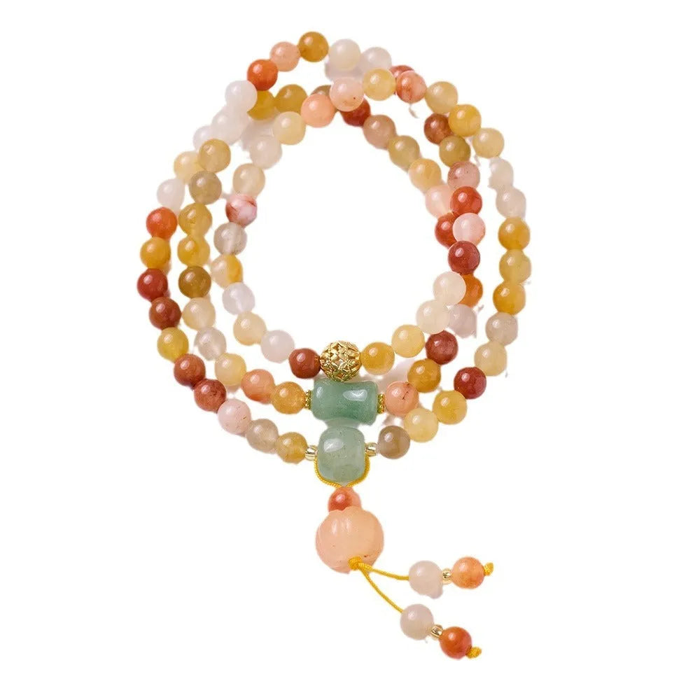 Women's handcrafted three-circle pumpkin tassel bracelet in Jinsi Jade