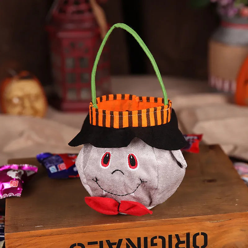 Halloween candy bag with pumpkin pattern measuring 16cm x 16cm with velvet material