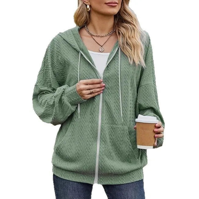 Green women's hooded sweatshirt coat with a full front zipper in a loose casual style.