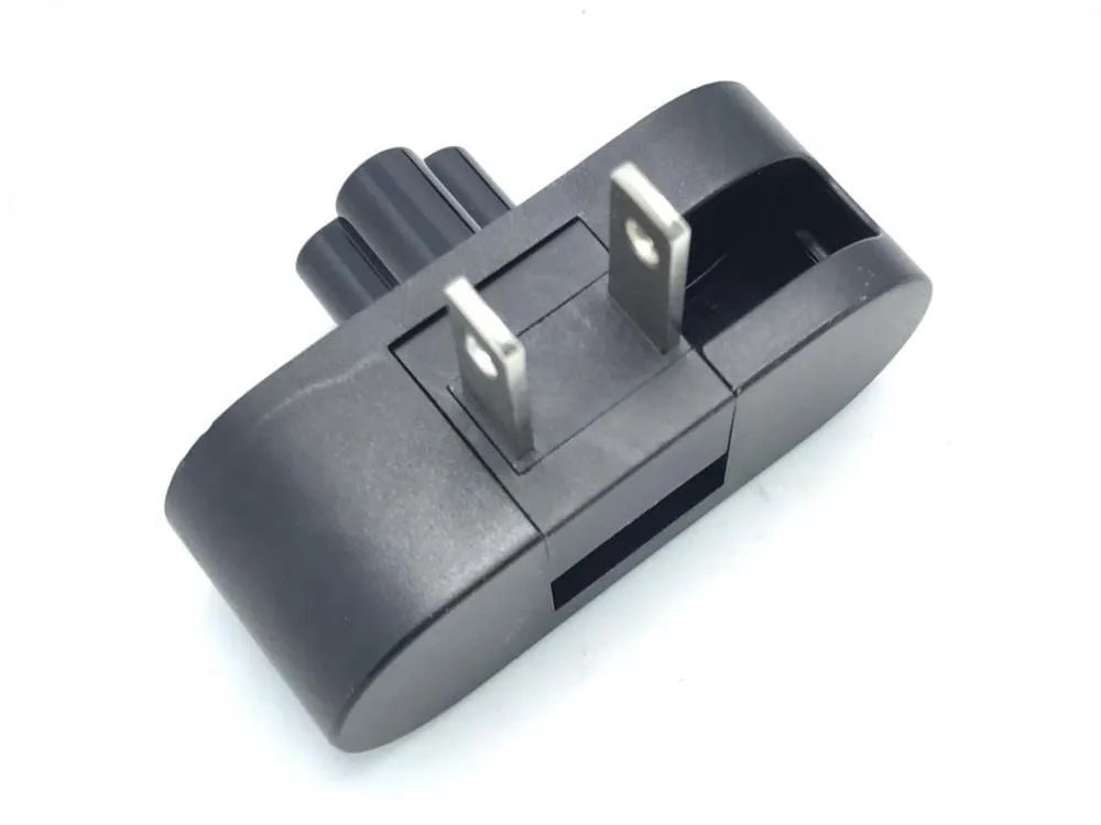 Black folding US plug for laptop chargers showing straight and 90-degree angled positions.