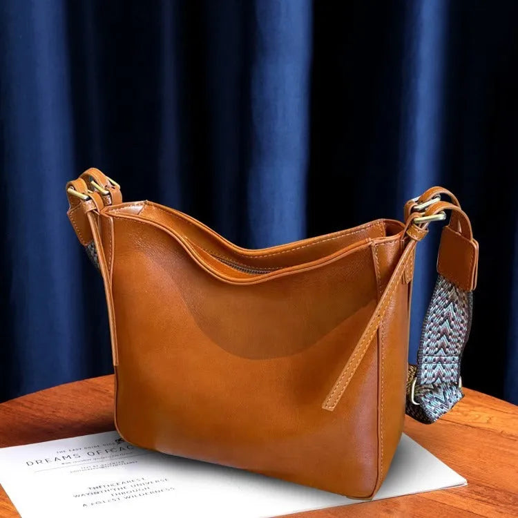 Genuine leather women's shoulder messenger bag in urban simplicity style with multiple internal compartments