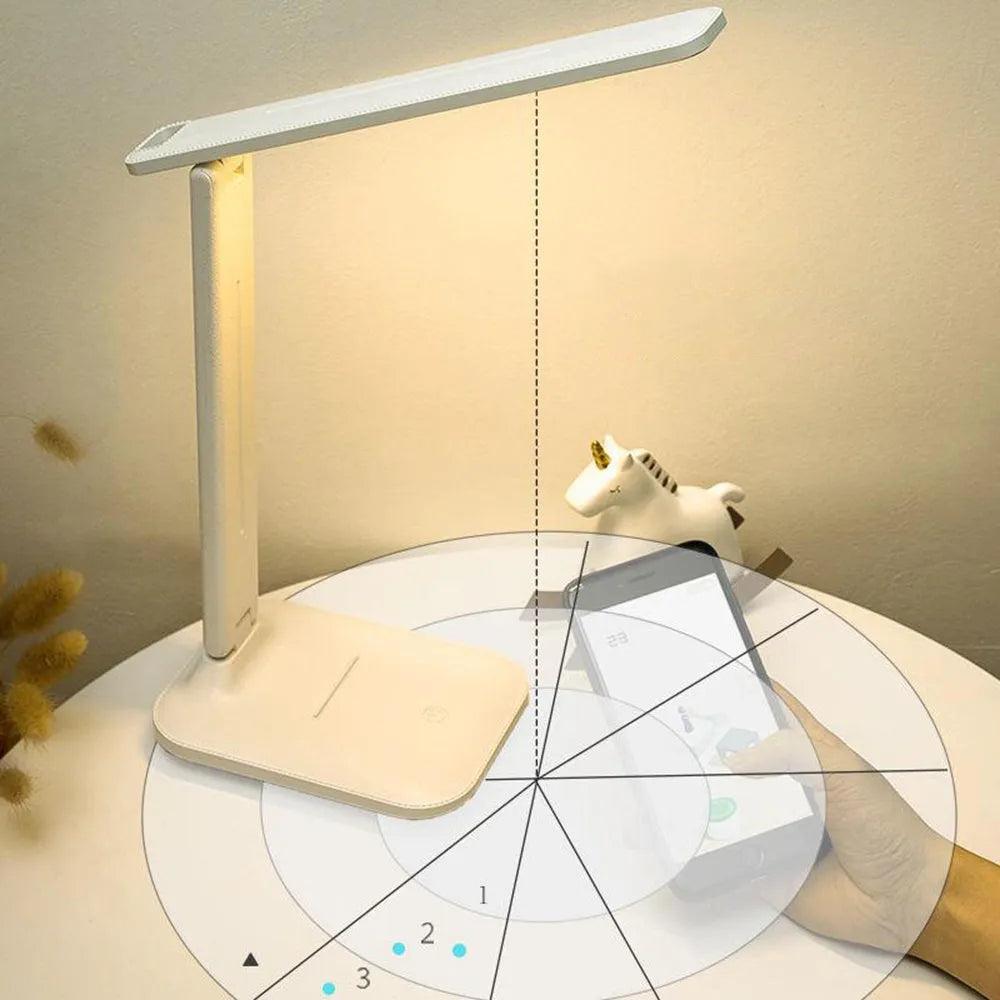 White plastic bedside lamp with touch dimming control and USB charging port