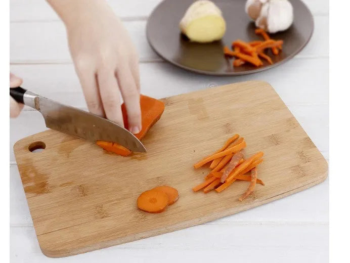 Square Moso bamboo cutting board 28 by 17 by 1 centimetres with antibacterial protection