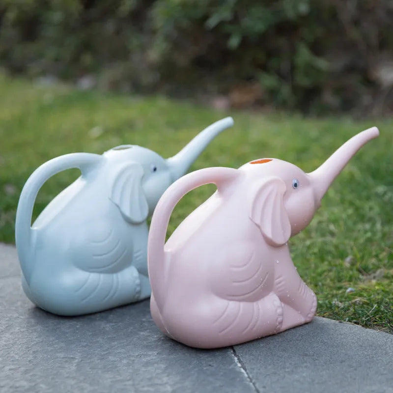 Blue elephant-shaped children's plastic watering can with a long nozzle and ergonomic handle.