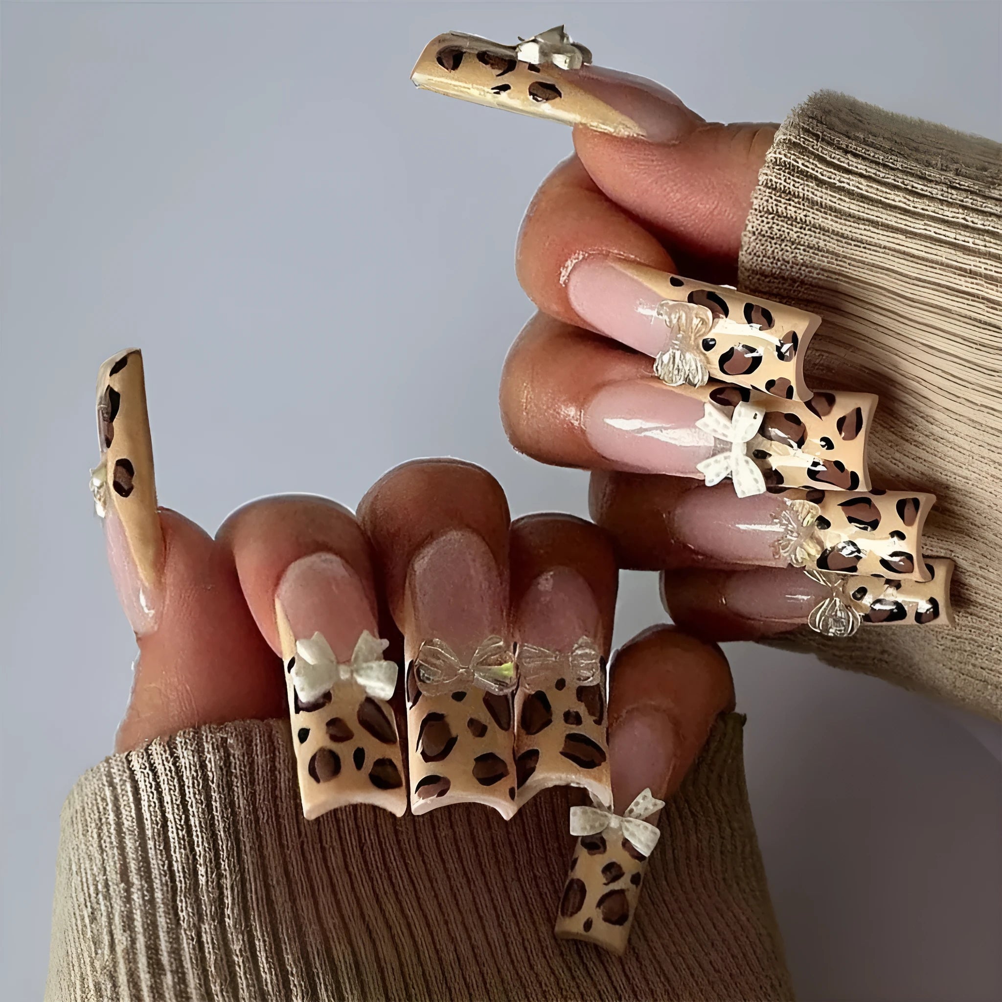 Leopard print butterfly nail art decorations with 3D designs in WM296 colour for women's manicures