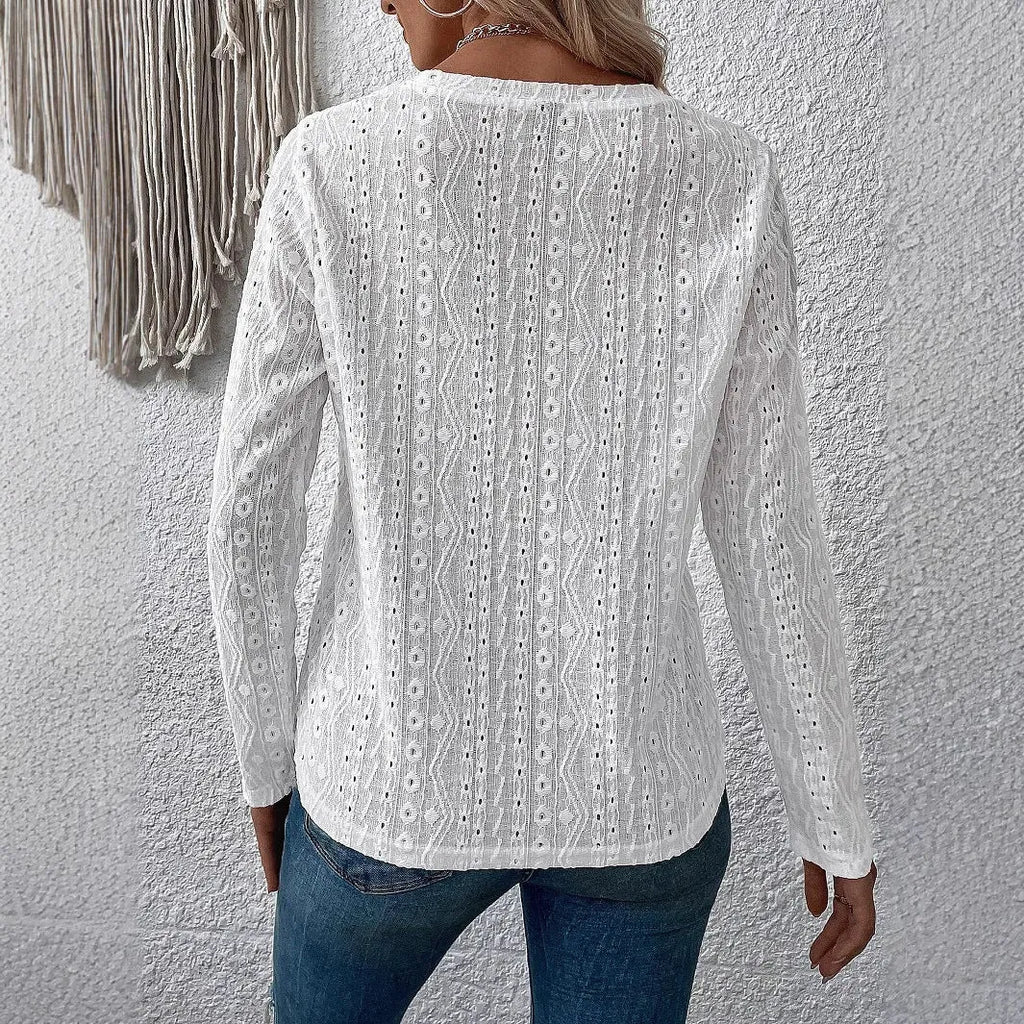 White women's long sleeve t-shirt with round neck and loose fit design