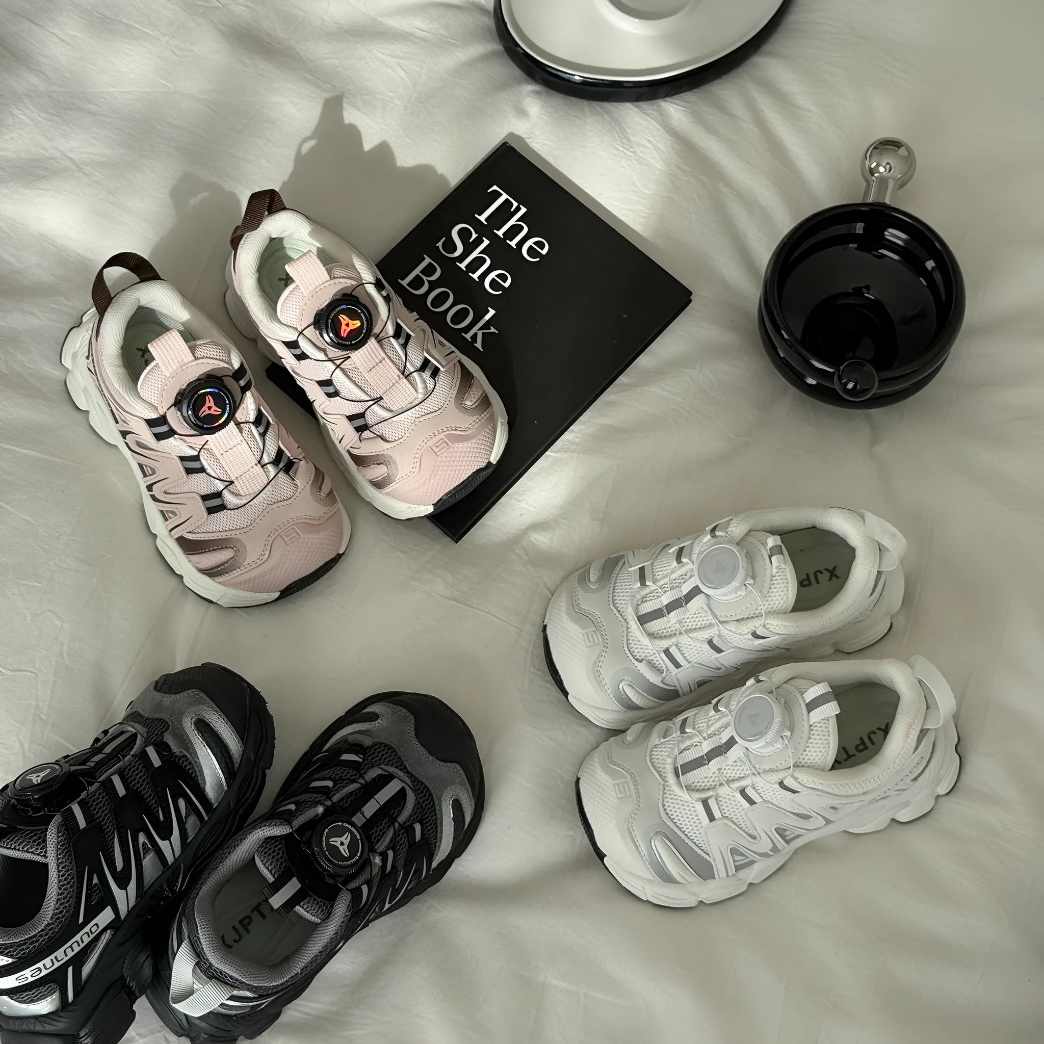 Girls' casual shoes in beige, black, or pink with a breathable PU leather mesh upper.