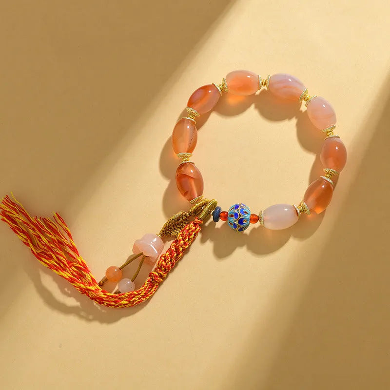 Vintage ethnic style jinsi jade agate Tibetan bracelet with floral and geometric shapes.