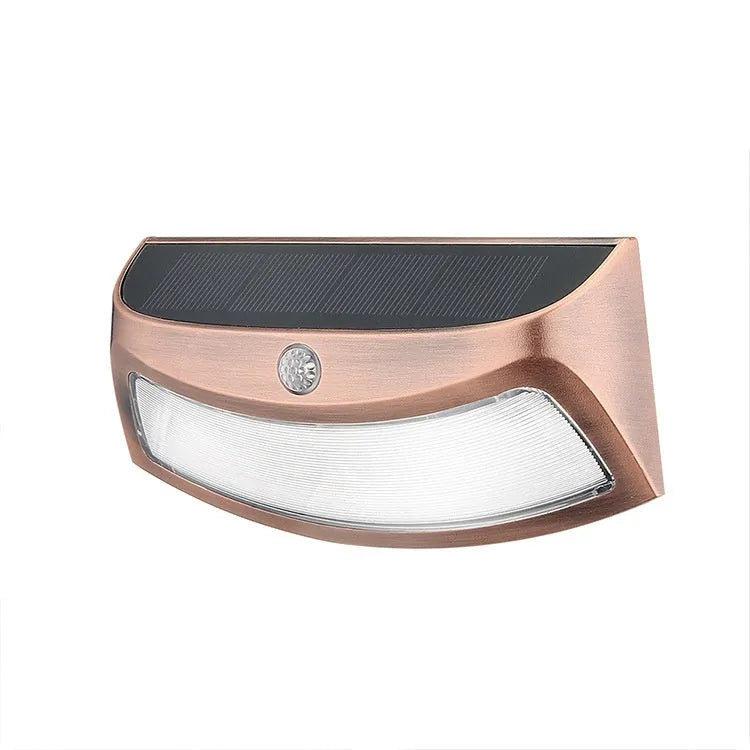 Solar garden wall lamp with retro smiling face design for outdoor decorative lighting