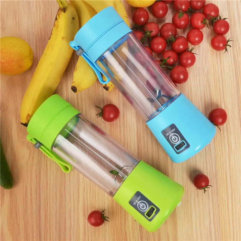 Portable pink USB electric fruit juicer with stainless steel blade and carrying rope