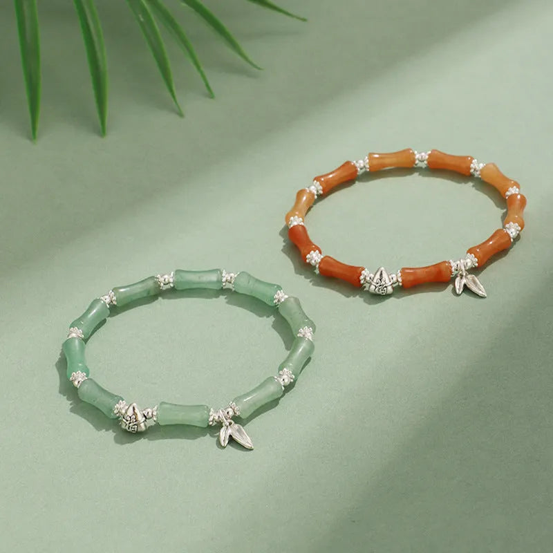 Green aventurine bamboo strawberry crystal bracelet with electroplated finish on adjustable elastic cord