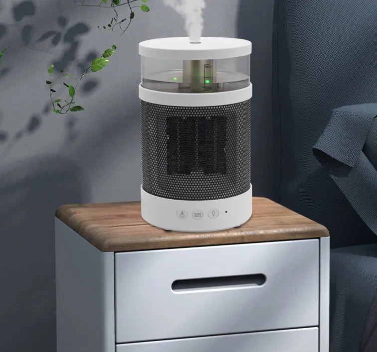 White 3 in 1 portable space heater with 400ml humidifier and colourful night light on a desk