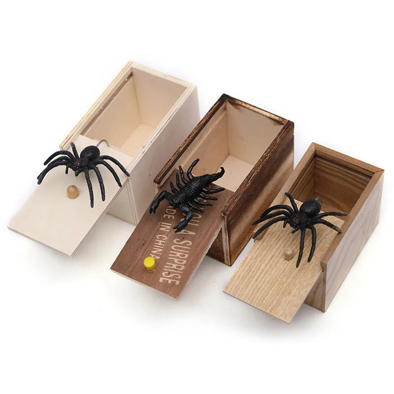 Wooden prank scare box with jumping spider surprise for April Fools jokes