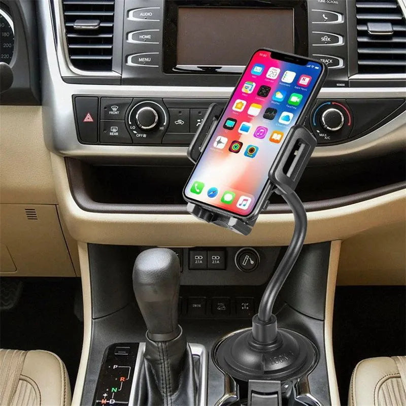 Black universal car phone mount with adjustable side arms shown mounted on a car air vent.