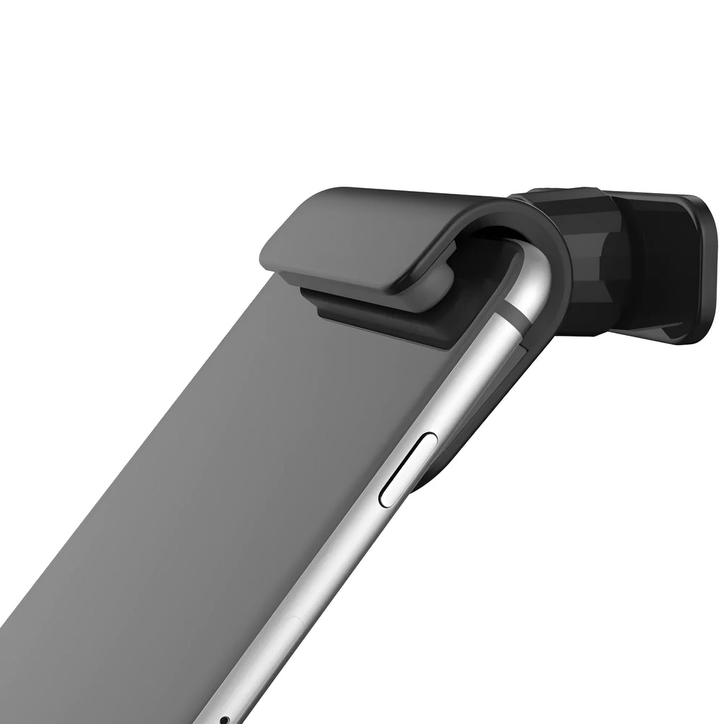 Black universal car phone holder with 360-degree rotating head on a car dashboard.