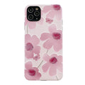 Pink soft rubber iPhone case with Japanese-Korean design showing lanyard hole